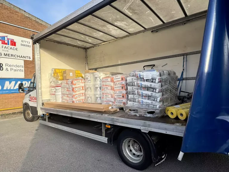 crucial transport van delivering pallet load to facade hub